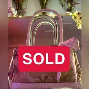 Stylish Tan and Cream Coach Bag